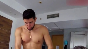 Wet latina female sensual kissing in the pool