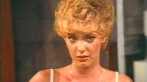 Short haired teen playing with Ron Jeremy